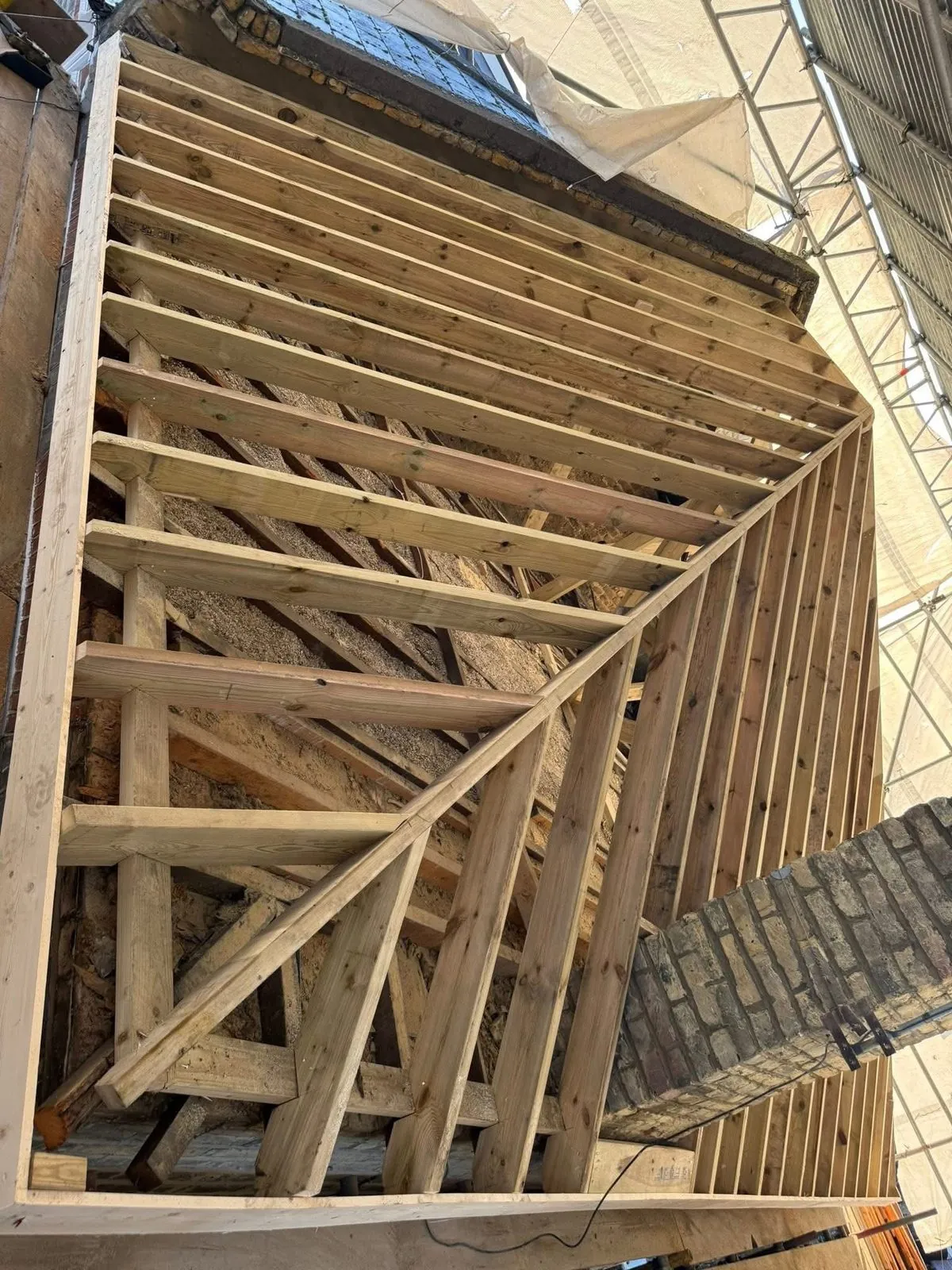 New roof timbers and rafters during a re-roof in Porthleven